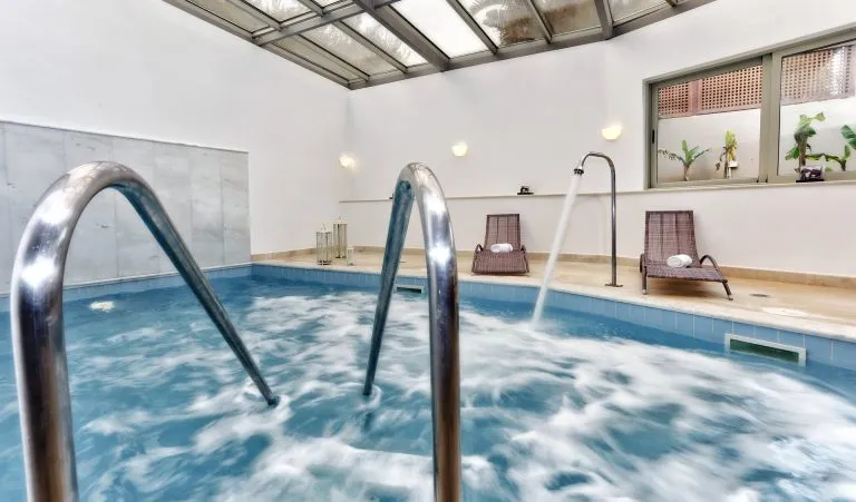 Blue sea beach indoor pool jacuzzi
