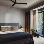 Domes of elounda Premium-Suite mit Jacuzzi im Freien Schlafzimmer